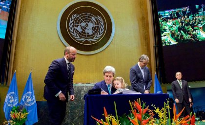 US Secretary of State John Kerry signs the COP21 UN Climate Change agreement. 